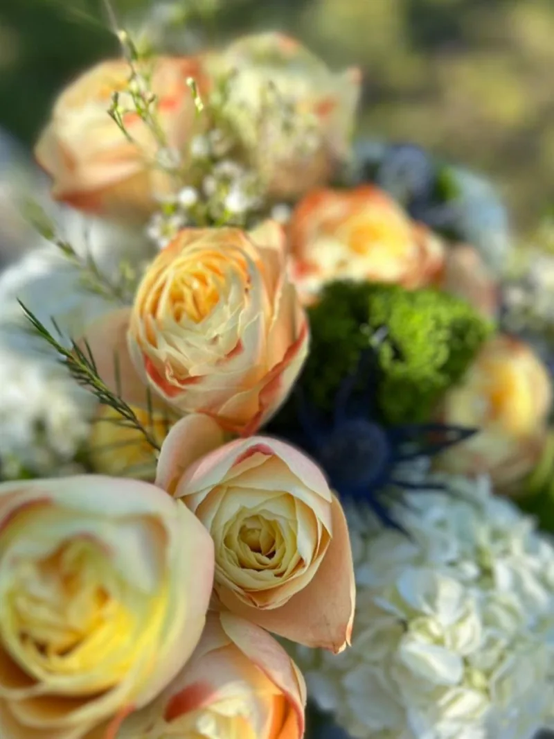 Yellow rose arrangement by Vintage Blooms, a Kansas City florist
